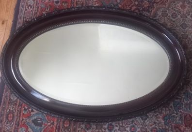 Edwardian oval bevelled mirror.