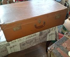 Vintage Hard Travel Suitcase, 1940s to 1950s, featuring a rigid textured brown exterior, metal corner guards, and a molded carry handle, Measurements are in the photo's, Postage Available or Collection