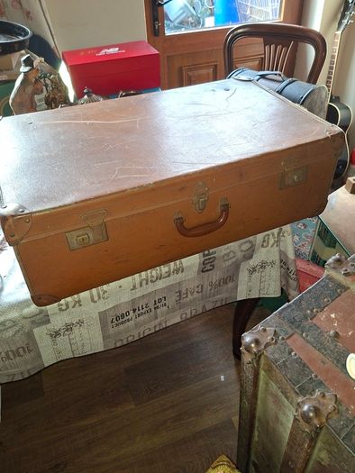 Vintage Hard Travel Suitcase, 1940s to 1950s, featuring a rigid textured brown exterior, metal corner guards, and a molded carry handle, Measurements are in the photo's, Postage Available or Collection