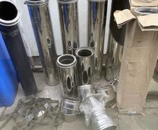 Stove insulated flu