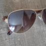 Lovely ELLE sunglasses with brown lenses, gold-tone frame and brown arms. Model WEL71SG03. Pre-owned condition, please see photos for details. Image 8