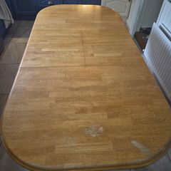 Extendable wooden dining table