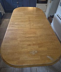 Extendable wooden dining table