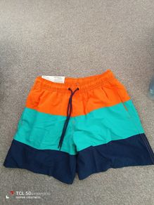 New.men's swimming shorts .size M