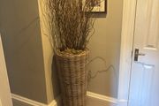 Very tall rattan planter with contorted willow