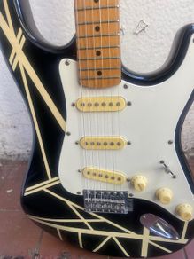 Vintage 1970s "Eagle" Stratocaster-style electric guitar, featuring a custom aftermarket cosmetic finish