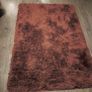 Red shaggy rug Image 2