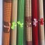 Ten Multicoloured woven bamboo placemats. Image 4