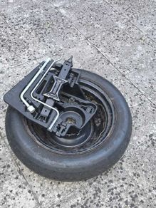 Used Spare Wheel Kit complete with Jack Tool.