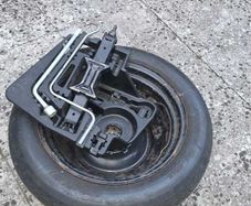 Used Spare Wheel Kit complete with Jack Tool.