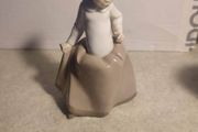 Lladro Nao Young Girl Porcelain Figurine in Tan Dress