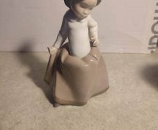 Lladro Nao Young Girl Porcelain Figurine in Tan Dress