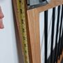 Oak and black metal stair gate Image 3