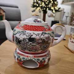 Fine porcelain tea pot with tea light warmer