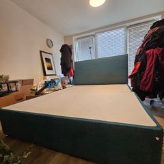 Teal fabric divan bed base with headboard