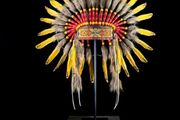 Large handmade Indian headdress on custom stand