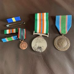 3 war medals sold as one lot.