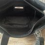 Tula black leather tote bag with a shoulder strap. Image 8