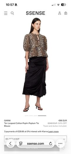 GANNI leopard print bow top