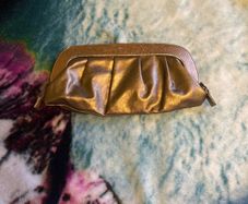 Gold small clutch bag