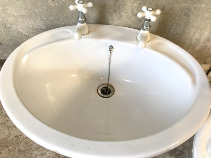 White Ceramic Over Counter Basin with White Taps