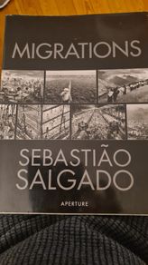 Migration. Sebastiao Salgado. Aperture. Fabolous First Edition Large Volume Book In Very Good Condition. Complete with Exebition  catalogue from his Cork exhibition. 432 pages.