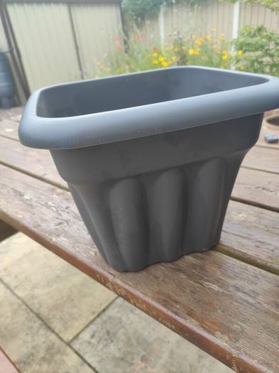 two plastic planters