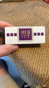 "Silk Cut" table menu holder