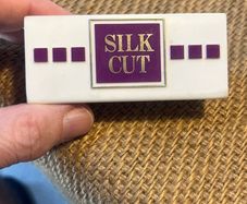 "Silk Cut" table menu holder
