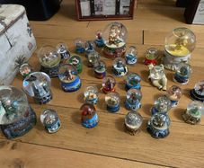 Large collection of different sizes of snow globes-OFFERS