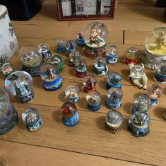 Large collection of different sizes of snow globes-OFFERS