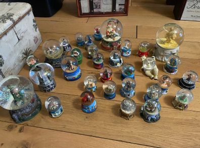 Large collection of different sizes of snow globes-OFFERS