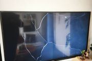 Sony 48" Smart TV with cracked screen (for parts/repair)