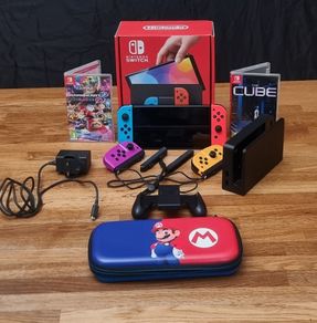 Nintendo Switch OLED Neon and accessories