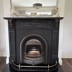 Cast iron fireplace , silver surround & fire guard