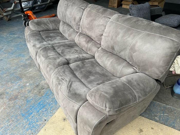 Grey 3 seater recliner sofa.