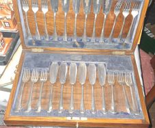 Beautiful Old Set of 24 Silver Plated Fish Cutlery, Presented in a Fitted Wooden Canteen Lined in Blue Fabric. JEWELLERS & SILVERSMITHS, Sutherland v Horne 10 South St. Andrew St. EDINBURGH