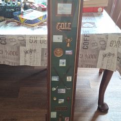 Beautiful Wooden Golf-Themed Shadow Box and Storage Unit with Shelves Cabinet, featuring a glass door front Inside the glass display panel, it showcases a vintage-style collage celebrating the history of golf,