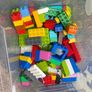 Box of Lego. 4 Figures and 4 Small Base Plates Image 3