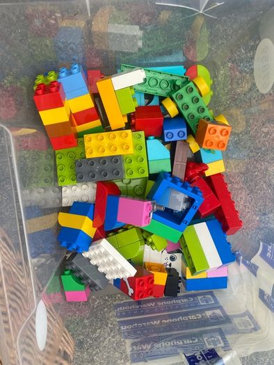 Box of Lego. 4 Figures and 4 Small Base Plates