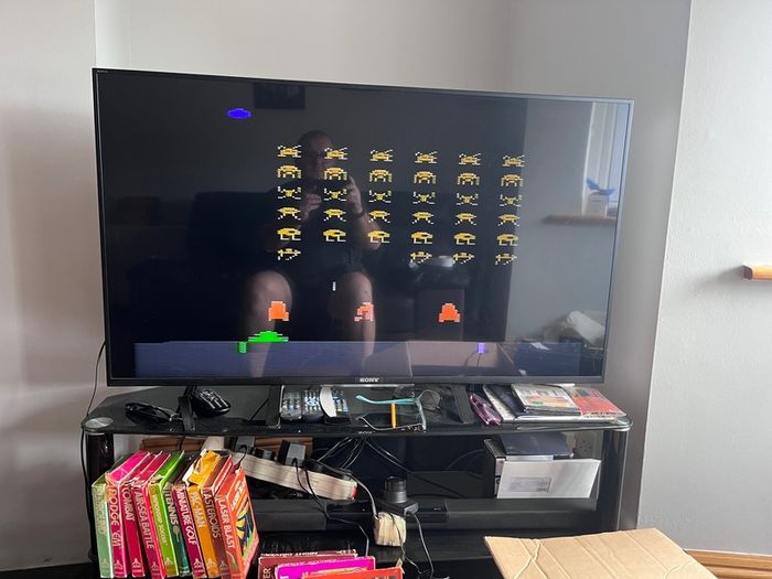 Atari 2600 Space Invaders Woody Atari 2600 with 15 individual games and 14 game Indy 500 driving