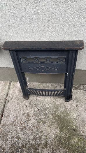 Two cast iron fire surrounds