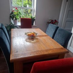 Dinning table and 6 chairs and a small side Table