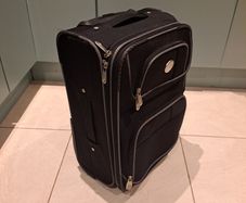 Small-Medium Luggage (Broken Handle)
