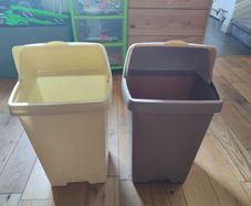 Two 50l plastic bins with lids