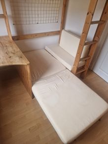 High-rise bed with desk and sofa