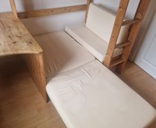 High-rise bed with desk and sofa