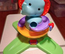 Fisher Price, Musical Swirling Surprise Elephant Toy (used).