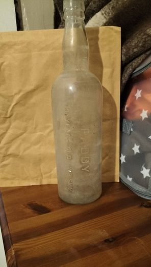 vintage  Paddy's whiskey bottle