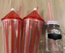 Glass cup with lid and straw